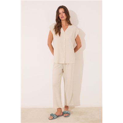 Conjunto pantalón y camiseta marfil lurex