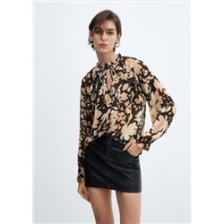 Blusa fluida estampado floral