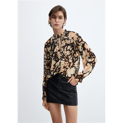 Blusa fluida estampado floral