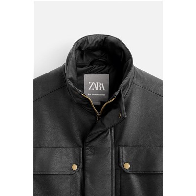 PARKA EFECTO PIEL BOLSILLOS