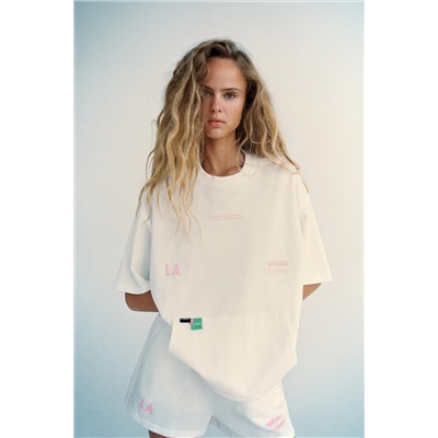 SWEATSHIRT WITH SLOGAN PATCHES