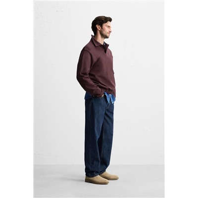 POLO INTERLOCK BOLSILLO