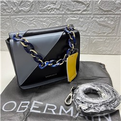 Мини-сумка немецкого бренда Obermai*n с акриловой уороткой цепочкой и длинным ремешком. Экспорт