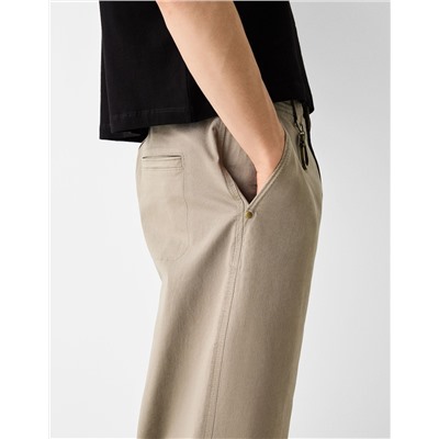 Skater-fit trousers with lobster clasp