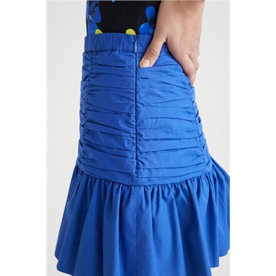 Minifalda drapeada volante