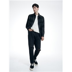 Jeans im Carrot-Fit in Used-Optik