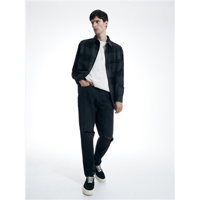 Jeans im Carrot-Fit in Used-Optik