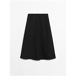 Midi skirt with topstitching detail on the hem