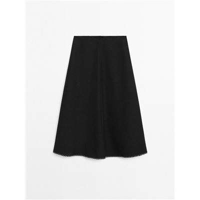 Midi skirt with topstitching detail on the hem