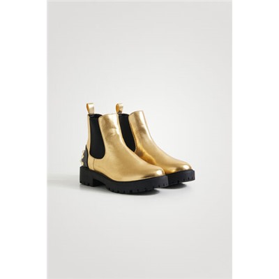 Botines biker oro tachuelas