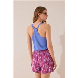 Pantalón corto estampado morado