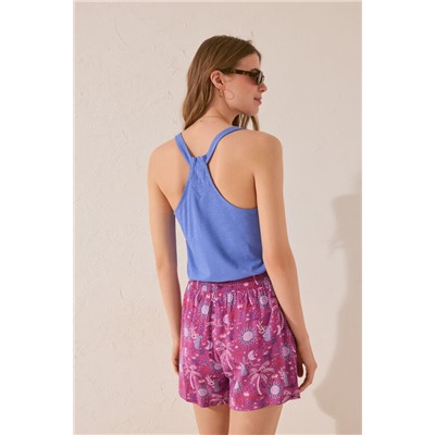 Pantalón corto estampado morado