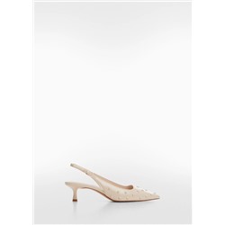 Zapato destalonado tachuelas