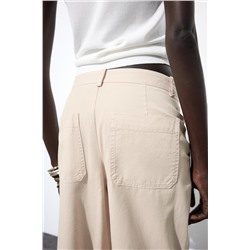 CHINO TROUSERS WITH DARTS
