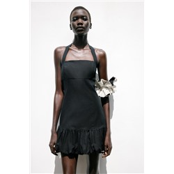 VESTIDO MINI BAJO ABULLONADO