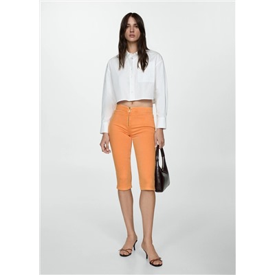 Jeans slim capri cremallera