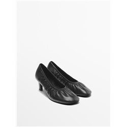 Gathered high heel shoes