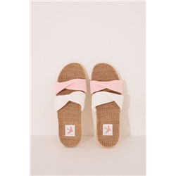 Zapatillas abiertas raffia nudos