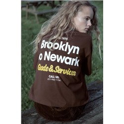 T-SHIRT WITH SLOGAN