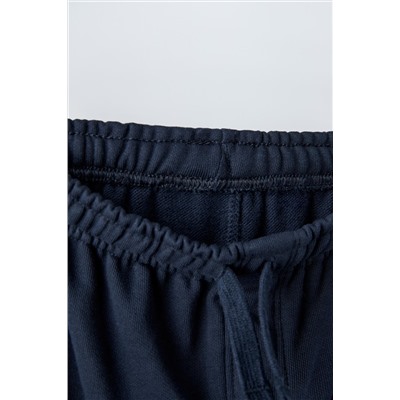 TROUSERS WITH EMBROIDERED SLOGAN