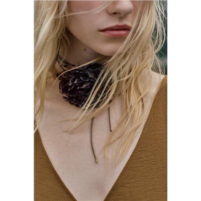ASYMMETRIC FLOWING TOP