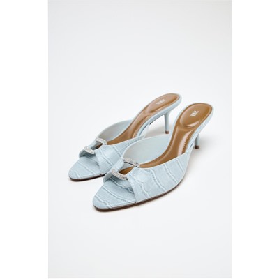 TEXTURED BUCKLE HEELED MULES