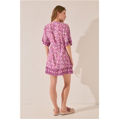 Camisola corta estampado flores morado