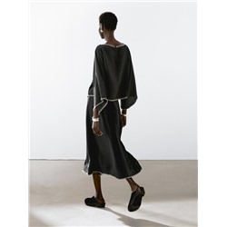 Cape blouse with batwing sleeves