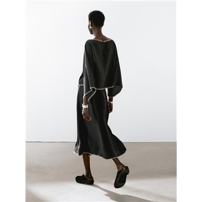 Cape blouse with batwing sleeves