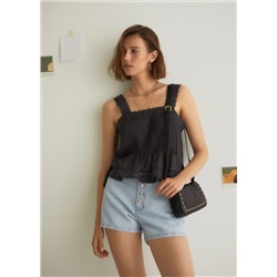Bolso piel tachuelas