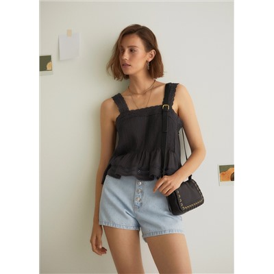 Bolso piel tachuelas