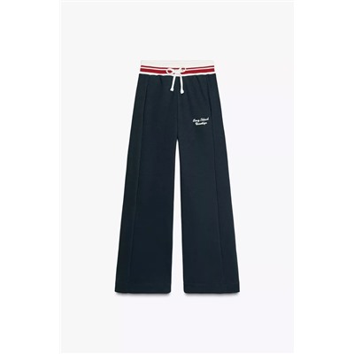 TROUSERS WITH EMBROIDERED SLOGAN