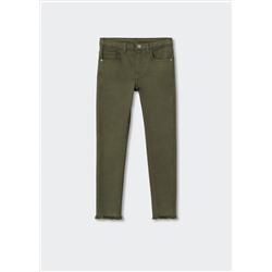 Jeans skinny bajo deshilachado