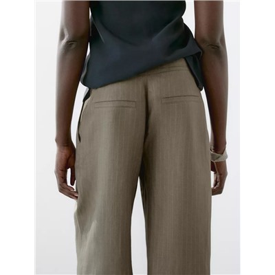 100% linen striped trousers with buckle detail