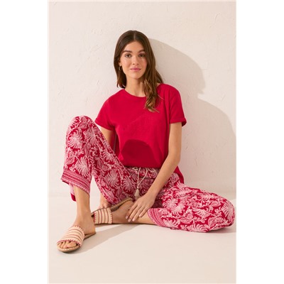 Pantalón largo viscosa estampado hojas rojo