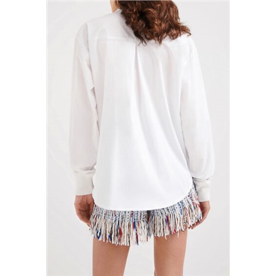 Camisa de patch y flecos