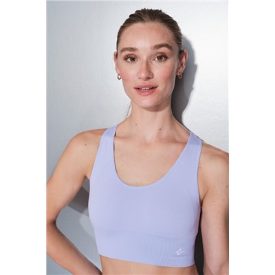 Sujetador deportivo reversible lila y blanco