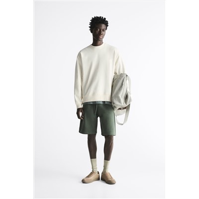 SUDADERA ETIQUETA COMBINADA