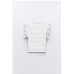 TEXTURED TOP WITH RUFFLE TRIMS