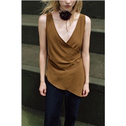 ASYMMETRIC FLOWING TOP