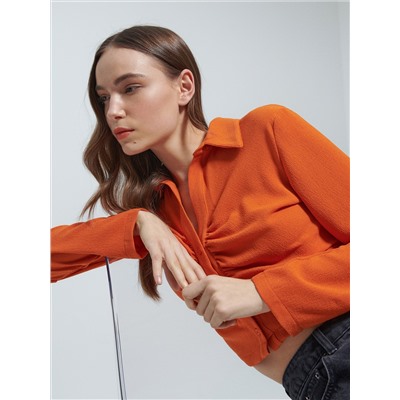 Weiße Bluse mit Raffungen