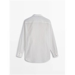 CAMISA SEMITRANSPARENTE DETALLE PECHERA