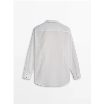 CAMISA SEMITRANSPARENTE DETALLE PECHERA