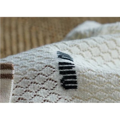 Женская футболка polo с ромбовидным узором  Mi*uMi*u