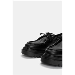 Zapatos acordonados