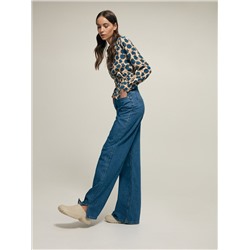 Jeans mit weitem Bein und geschlitzten Säumen