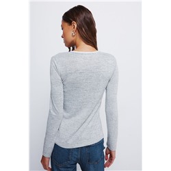 Camiseta botones hombro cuello