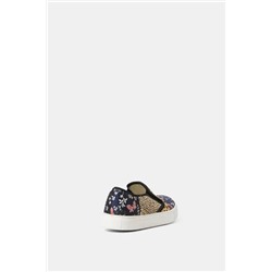 Sneakers slip on de piel
