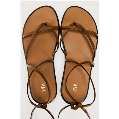 SANDALIA PLANA PIEL ATADA