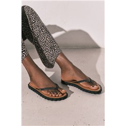 Chanclas dedo efecto ondas negras